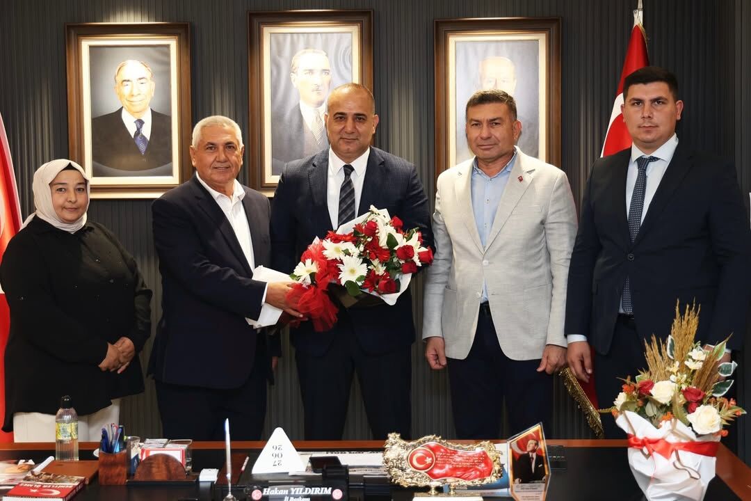 Karaisalı Heyetinden MHP Adana İl Başkanı Hakan Yıldırım'a tebrik ziyareti