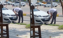 Adana’da uyuşturucu krizine giren şahıs otomobilin kaputunda görüntülendi