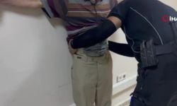 Beline ve bacaklarına sardığı esrarla yakalandı