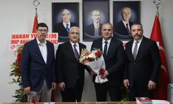 MHP Seyhan'da devir teslim: Turgut Bağdağı görevi devraldı