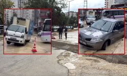 Adana’da sağanak sonrası yol çöktü: İki araç çukura saplandı