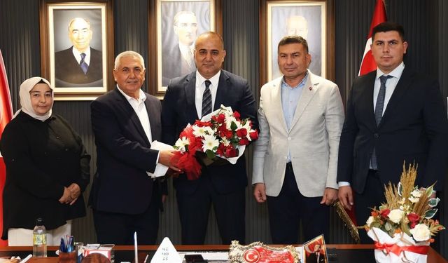 Karaisalı Heyetinden MHP Adana İl Başkanı Hakan Yıldırım'a tebrik ziyareti