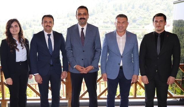 Karaisalı'da görev süresi dolan yargı mensuplarına veda ziyareti