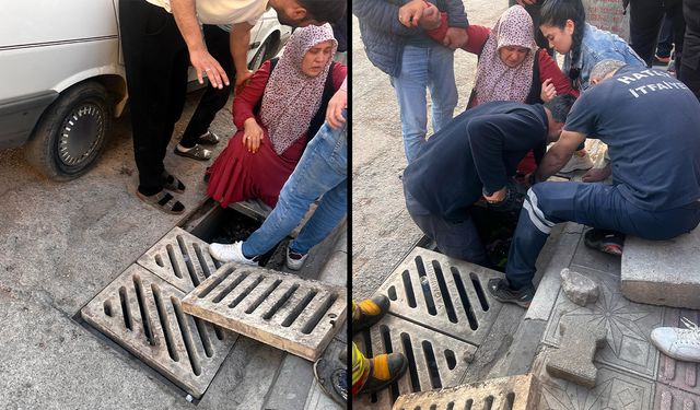 Ayağı mazgala sıkışan kadın zor anlar yaşadı