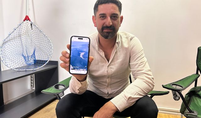 Oltaya köpek balığı takılınca korktular, ardından kurtarmak için çabaladılar