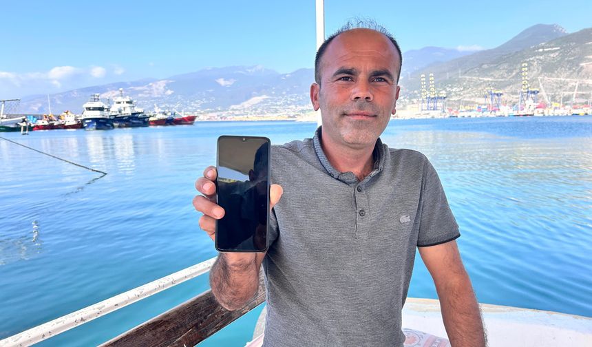 İskenderun’da oltaya takılan dev köpek balığı geri salındı