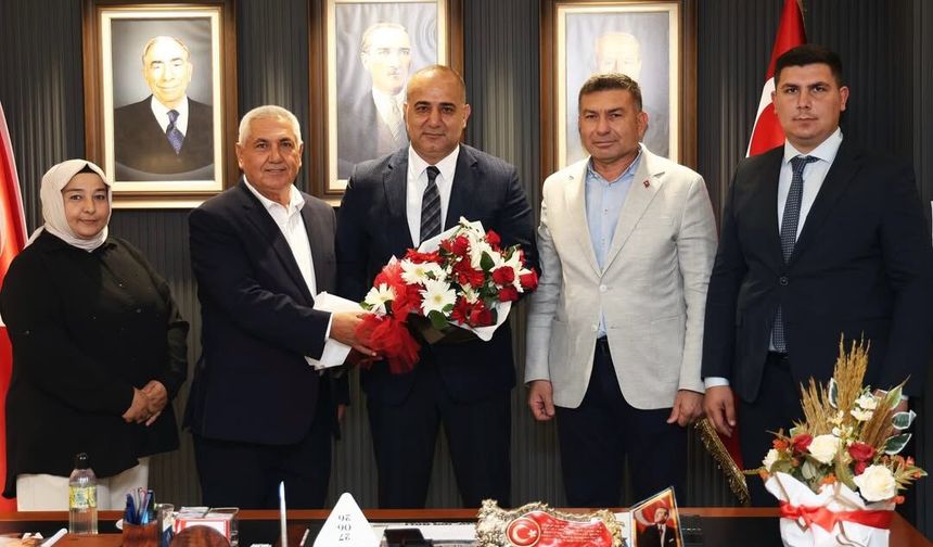 Karaisalı Heyetinden MHP Adana İl Başkanı Hakan Yıldırım'a tebrik ziyareti