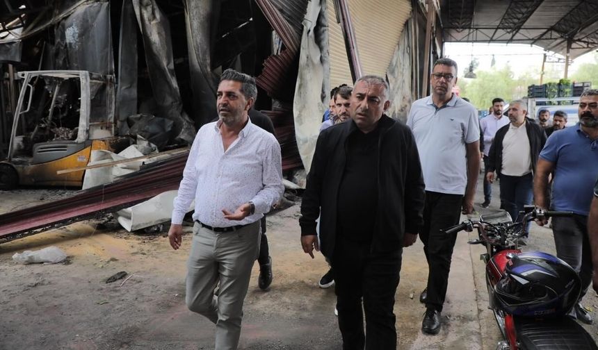 Güngör Geçer yangından etkilenen hal esnafıyla buluştu